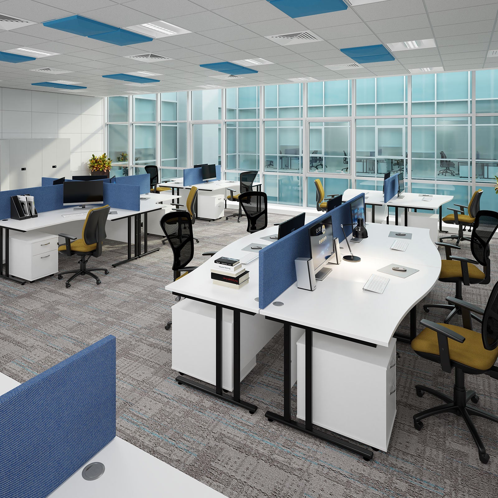 Modern office space with desks, chairs, and large windows.