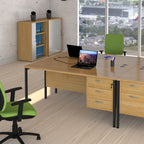 Modern office setup with wooden desk, chairs, and bookshelf.