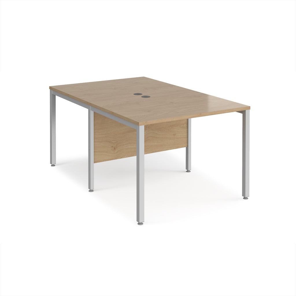 Back-to-back office desk with wood-effect top and silver metal frame on a white background