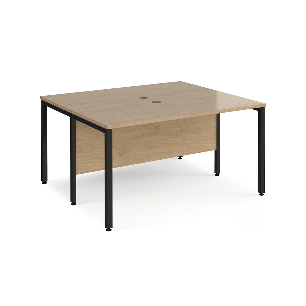 Back-to-back desk with wood-effect top and black metal frame on a white background