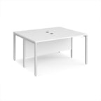 White back-to-back desk with metal frame on a white background