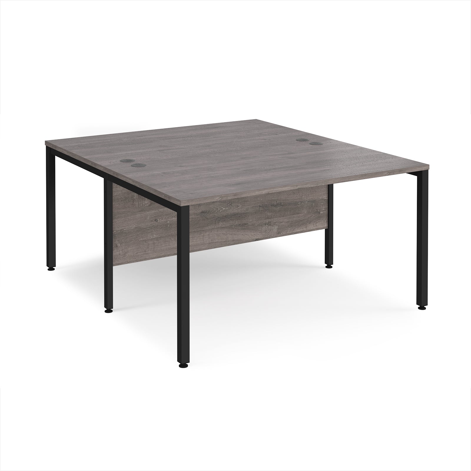 Back-to-back office desk with grey wood-effect top and black metal frame on a white background