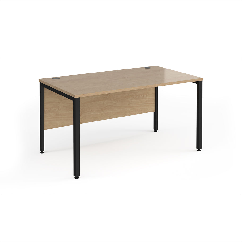Rectangular desk with wood-effect top and black metal legs on a white background