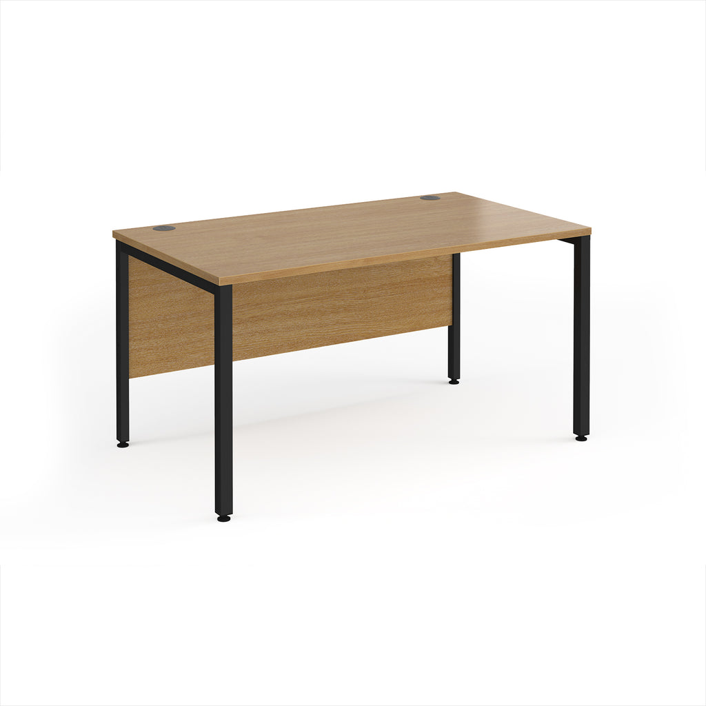 Rectangular desk with wood-effect top and black metal legs on a white background