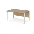 Office desk with wave wood-effect top and silver metal legs on a white background