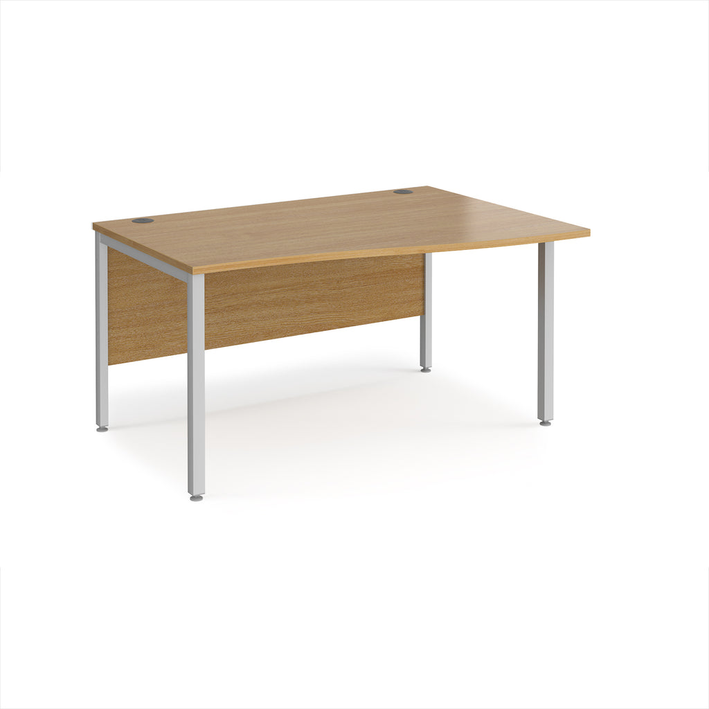 Office desk with wave wood-effect top and silver metal legs on a white background