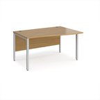 Office desk with wave wood-effect top and silver metal legs on a white background