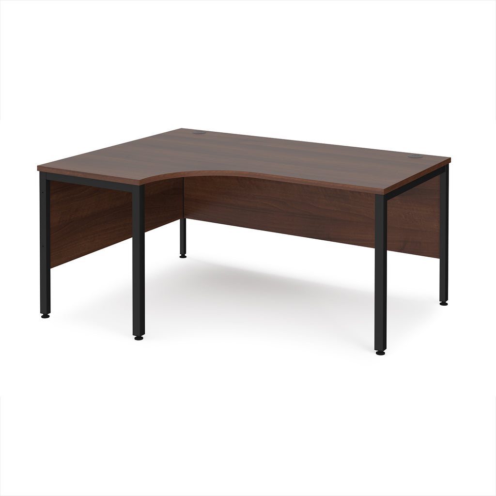Ergonomic office desk with wood-effect top and black metal frame on a white background