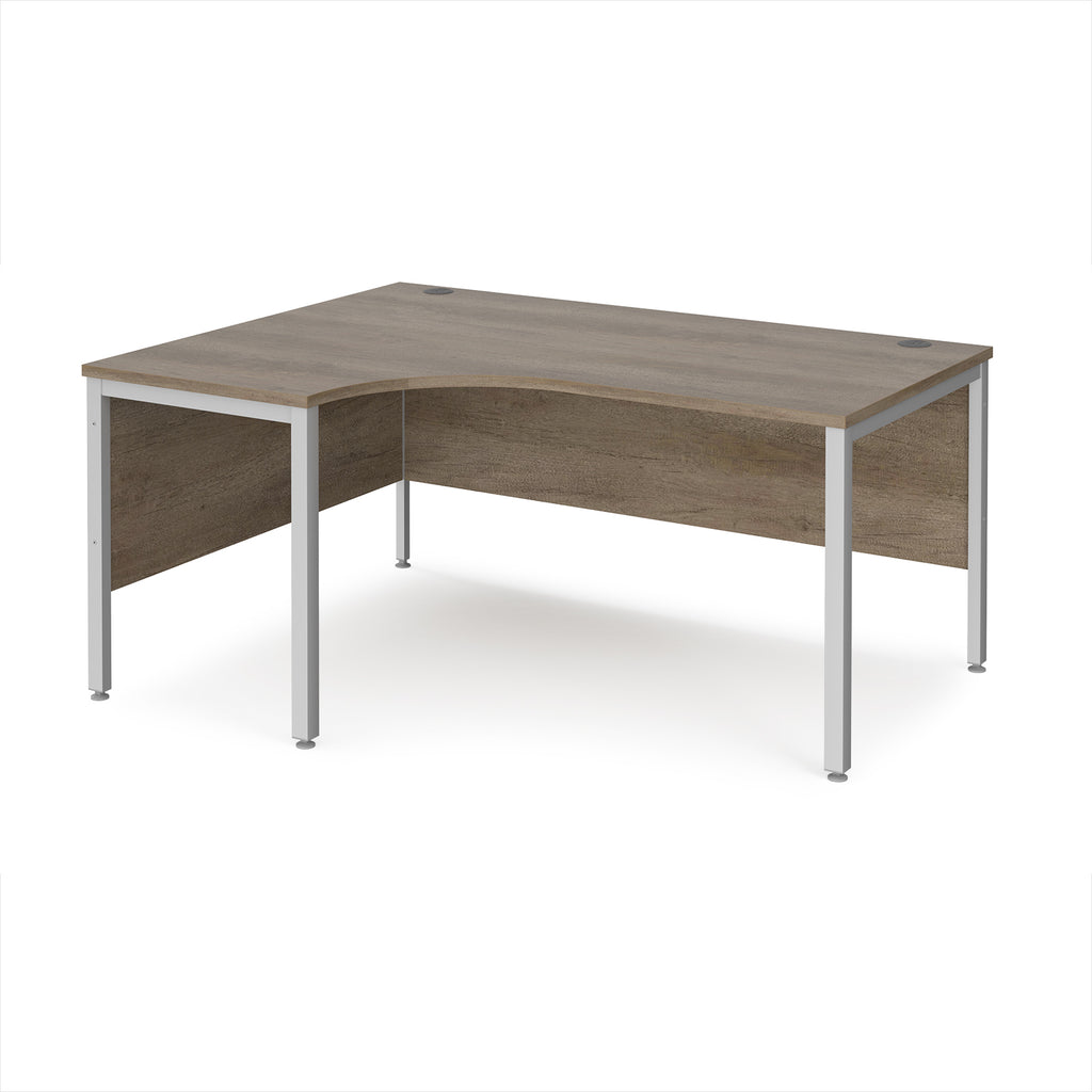 Ergonomic office desk with wood-effect top and silver metal frame on a white background