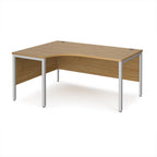 Ergonomic office desk with wood-effect top and silver metal frame on a white background