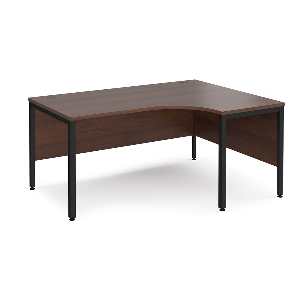 Ergonomic office desk with wood-effect top and black metal frame on a white background