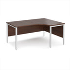 Ergonomic office desk with wood-effect top and white metal frame on a white background