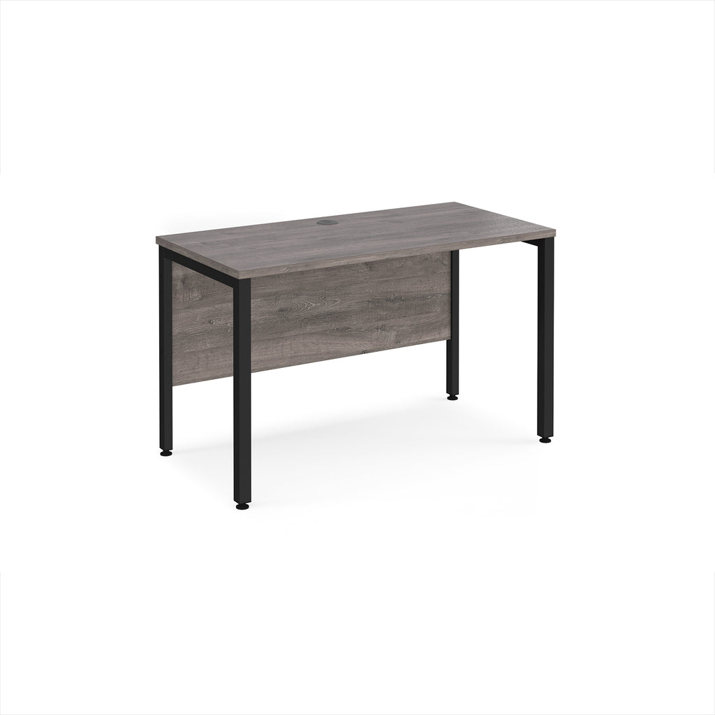 Office desk with grey wood-effect top and black metal frame on a white background