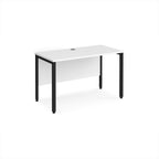 Office desk with white top and black metal frame on a white background
