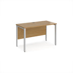Office desk with wood-effect top and silver metal frame on a white background