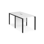 Back-to-back office desk with white top and black metal frame on a white background
