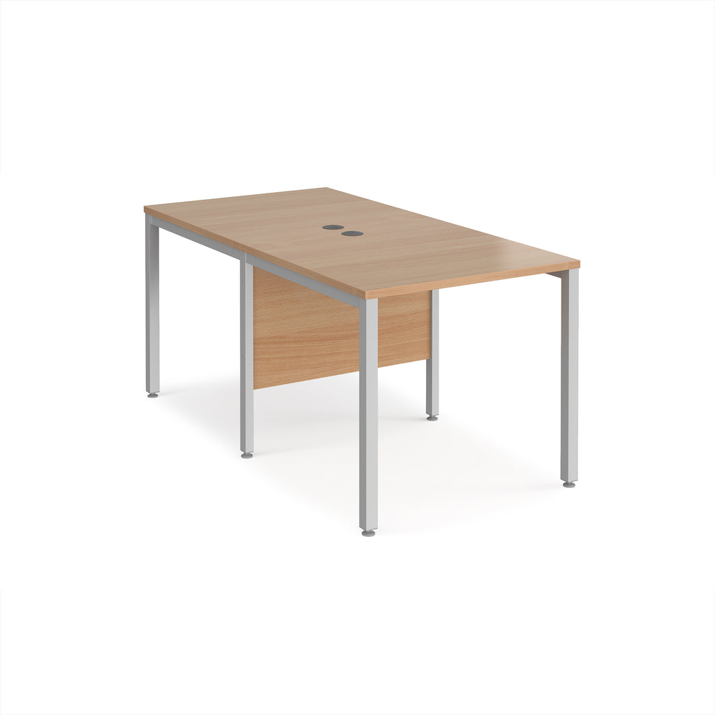 Back-to-back office desk with wood-effect top and silver metal frame on a white background