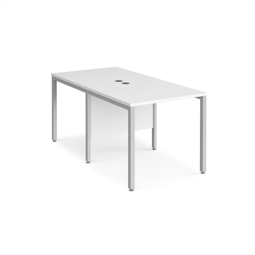 Back-to-back office desk with white top and silver metal frame on a white background