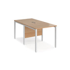 Back-to-back office desk with wood-effect top and white metal frame on a white background