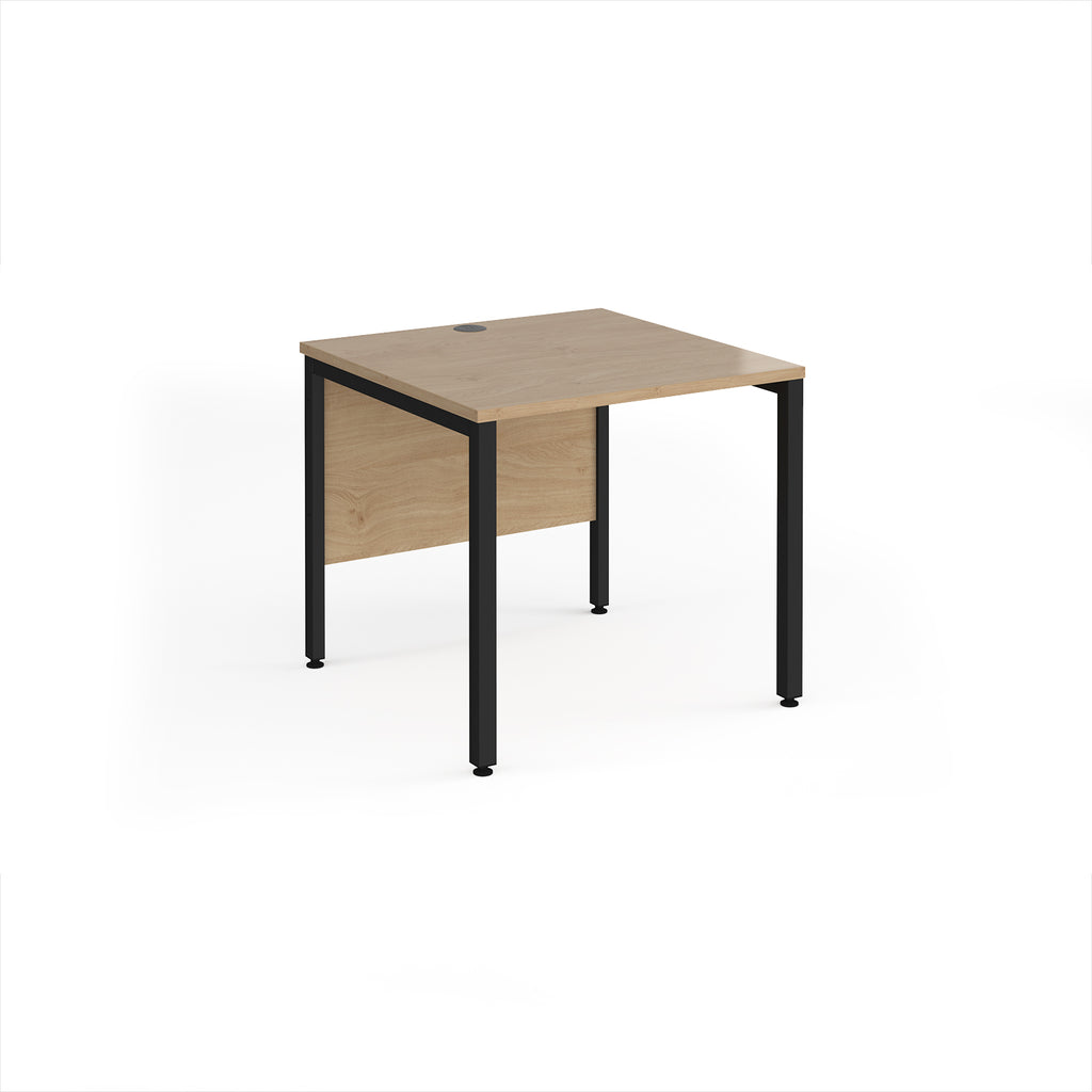 Rectangular desk with wood-effect top and black metal legs on a white background