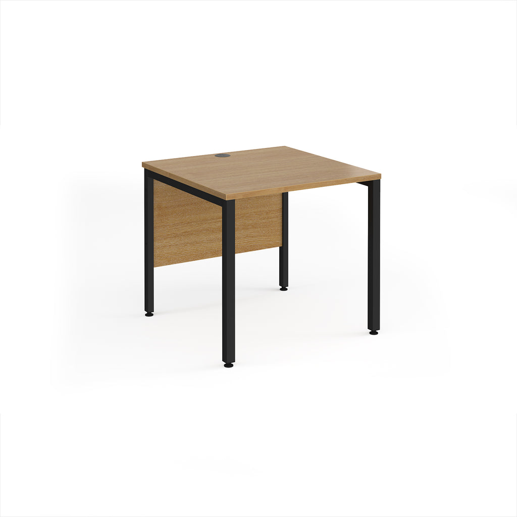 Rectangular desk with wood-effect top and black metal legs on a white background