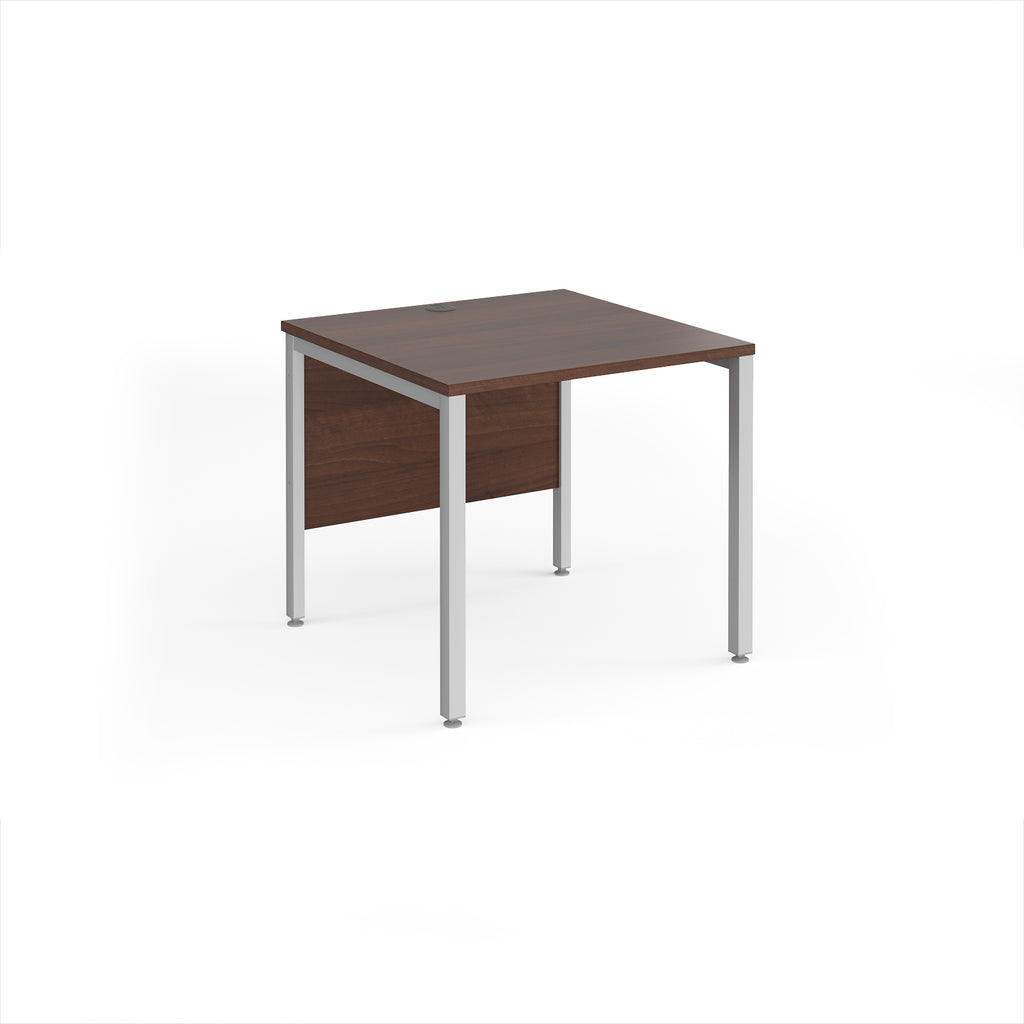 Rectangular desk with wood-effect top and silver metal legs on a white background
