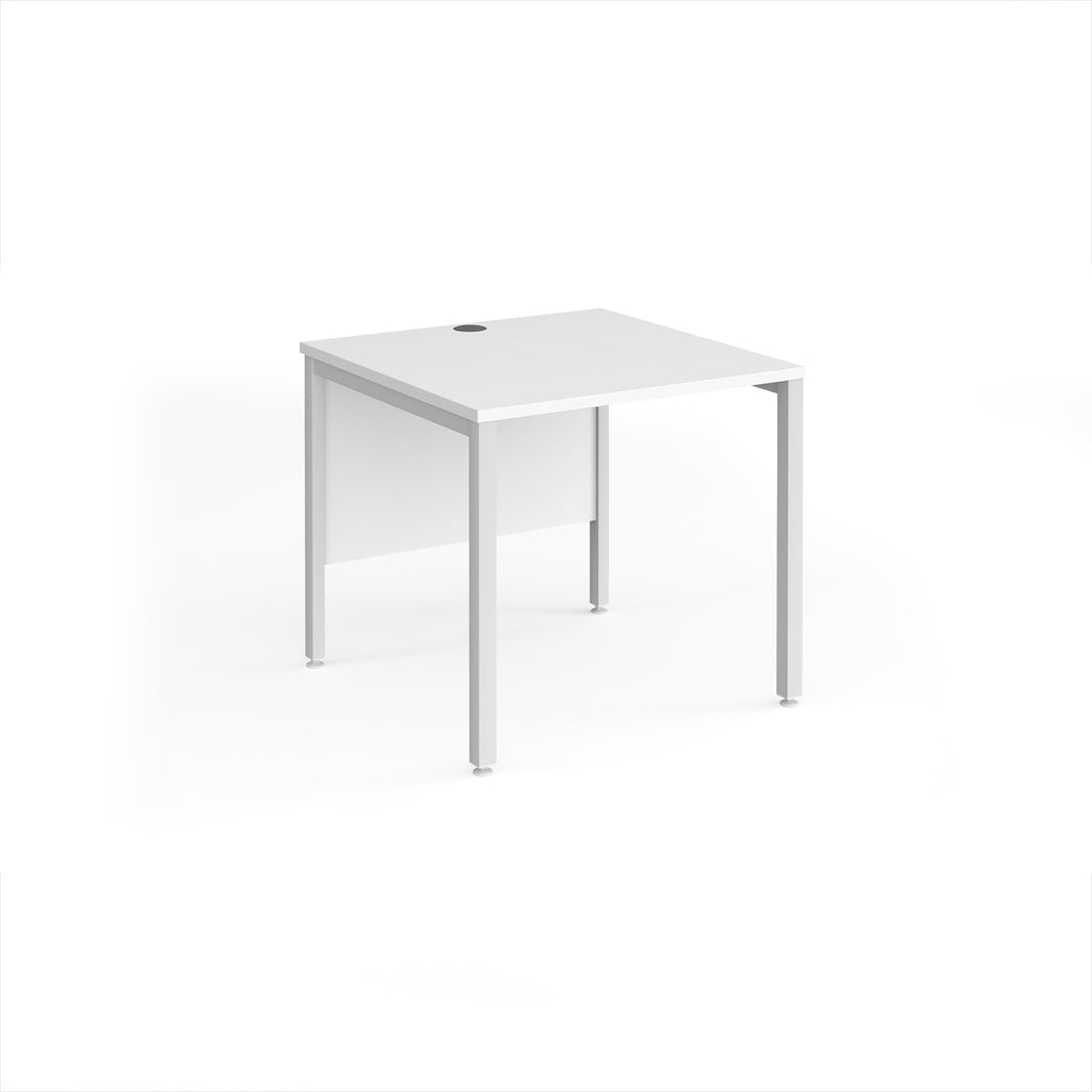 Rectangular desk with white top and white metal legs on a white background