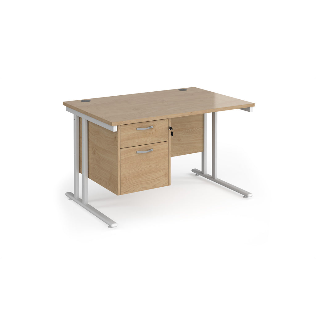 Wooden office desk with silver metal legs and fixed pedestal on a white background