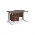 Wooden desk with silver metal legs and fixed pedestal on a white background