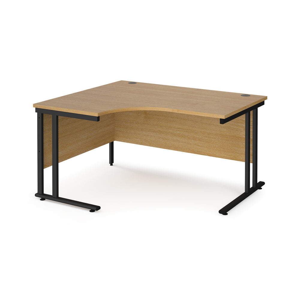 Wooden corner desk with black metal legs on a white background