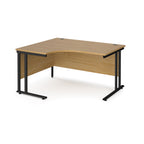 Wooden corner desk with black metal legs on a white background