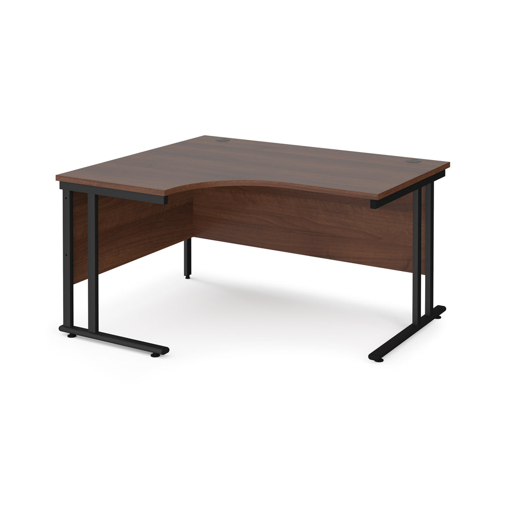 Wooden corner desk with black metal legs on a white background
