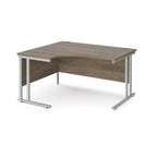 Corner office desk with wooden top and silver metal legs on a white background
