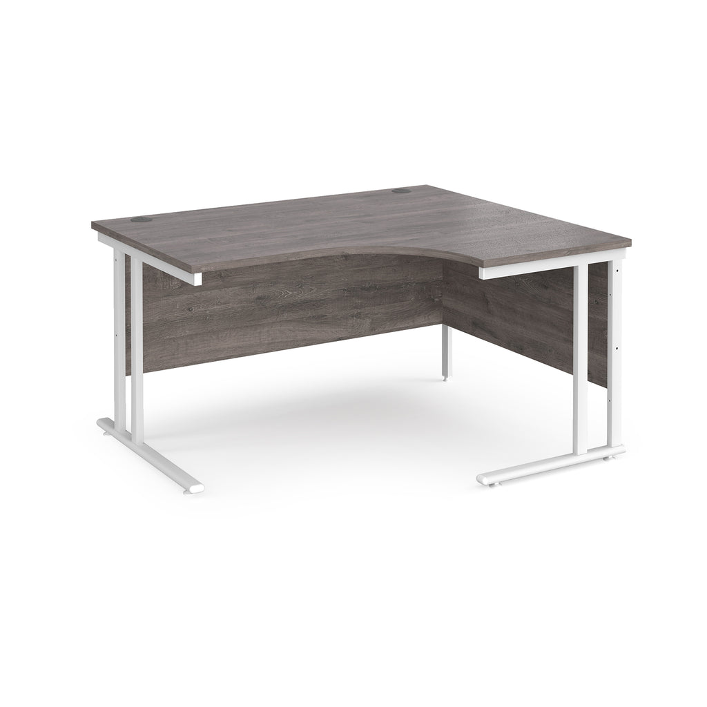 Corner office desk with wooden top and white metal legs on a white background