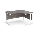 Corner office desk with wooden top and white metal legs on a white background