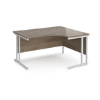Corner office desk with wooden top and white metal legs on a white background