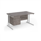 Wooden office desk with two drawers and metal legs on a white background