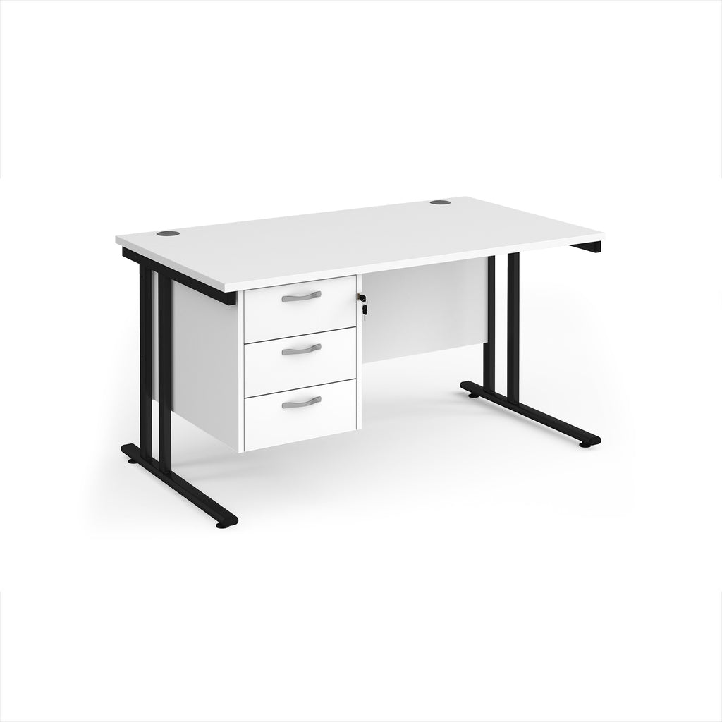 White office desk with black legs and three drawers on a white background