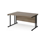 Wave desk with wood-effect top and black metal legs on a white background