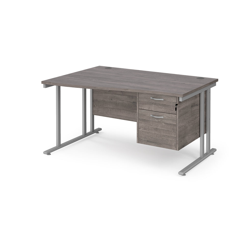 Wave desk with grey wood-effect top and matching pedestal with silver frame on a white background