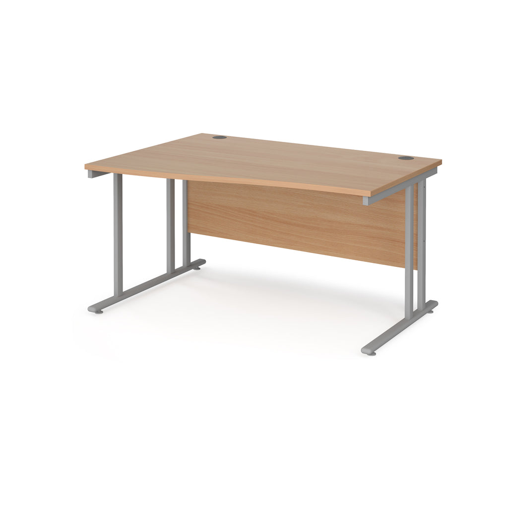 Wave desk with wood-effect top and silver metal legs on a white background