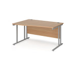 Wave desk with wood-effect top and silver metal legs on a white background