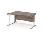 Wave desk with wood-effect top and silver metal legs on a white background