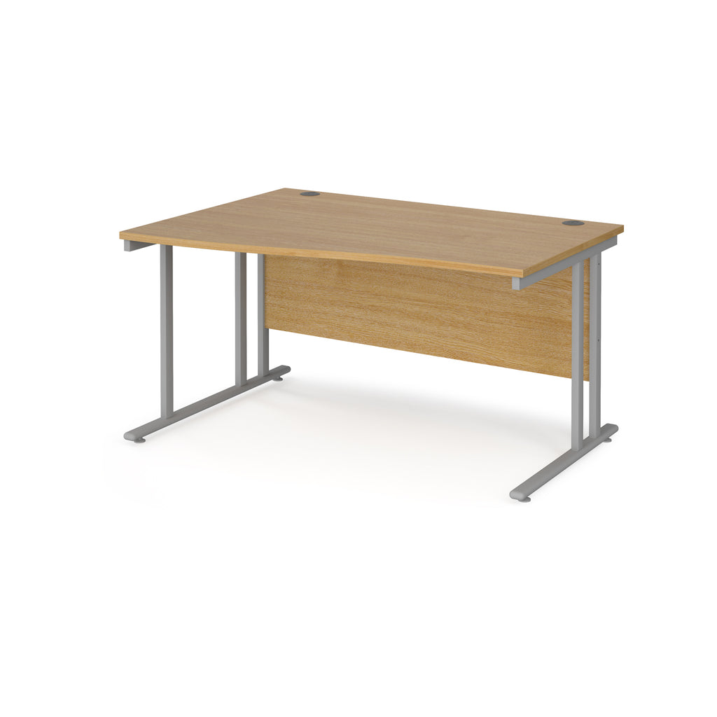 Wave desk with wood-effect top and silver metal legs on a white background
