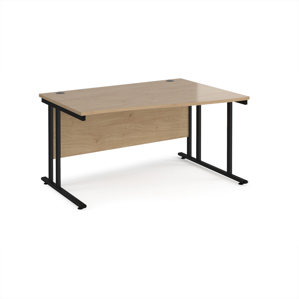 Wave desk with wood-effect top and black metal legs on a white background