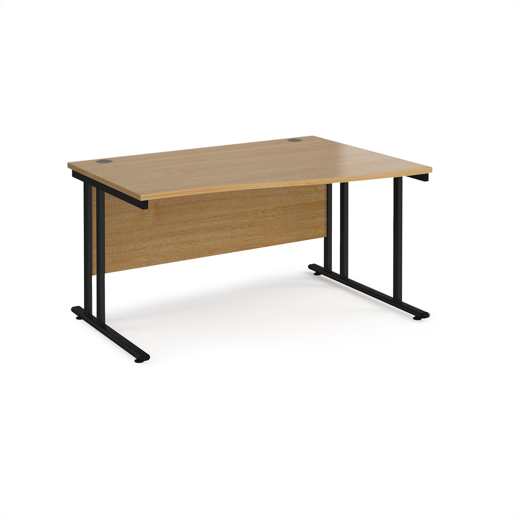 Wave desk with wood-effect top and black metal legs on a white background