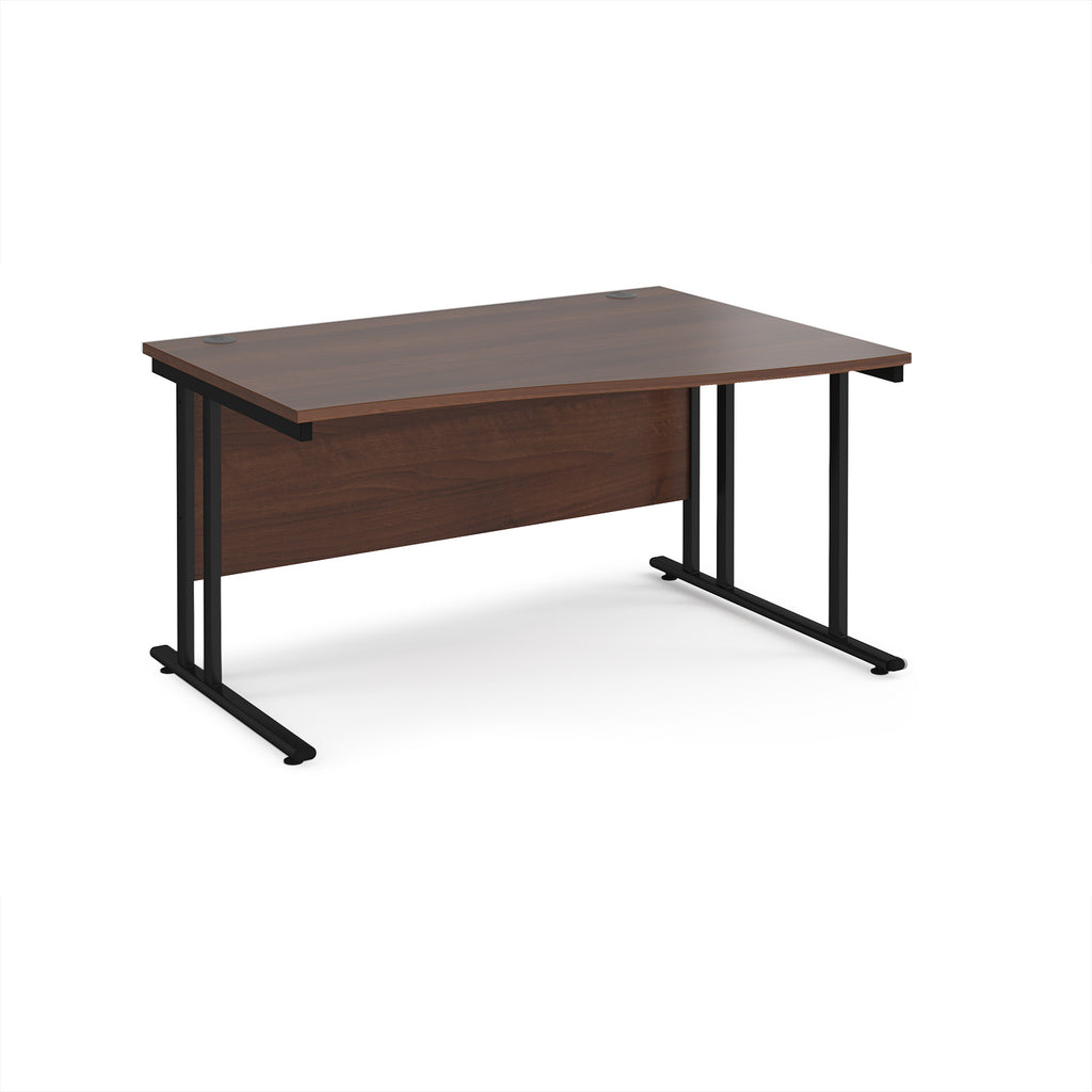 Wave desk with wood-effect top and black metal legs on a white background