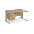 Wave desk with wood-effect top and matching pedestal with silver frame on a white background