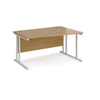 Wave desk with wood-effect top and white metal legs on a white background