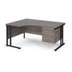 Ergonomic desk with grey wood-effect top and matching pedestal with black frame on a white background
